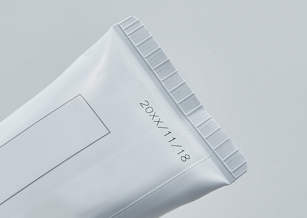 Beschriftungsbeispiel (Zahnpastatube)