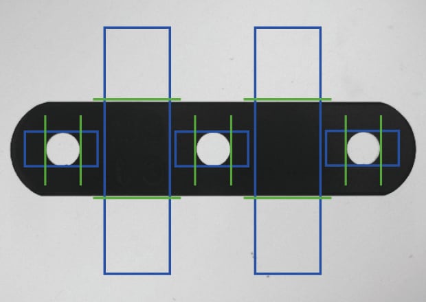 Maßprüfung von Metallteilen im Durchlicht